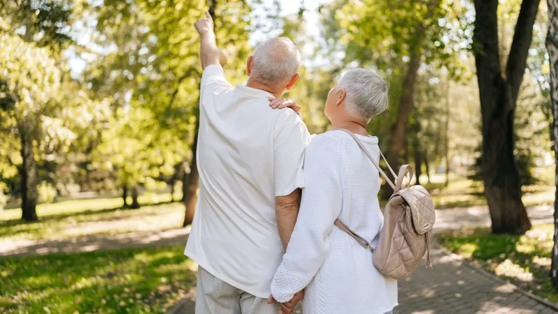 Active senior couple walking outdoors